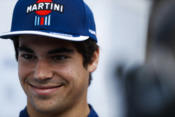 Lance Stroll, Williams Racing, talks to the media