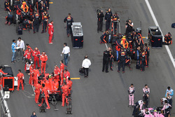 Kimi Raikkonen, Ferrari SF71H and Max Verstappen, Red Bull Racing RB14 on the grid