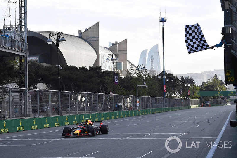 Max Verstappen, Red Bull Racing RB14 takes the chequered flag at the end of Qualifying