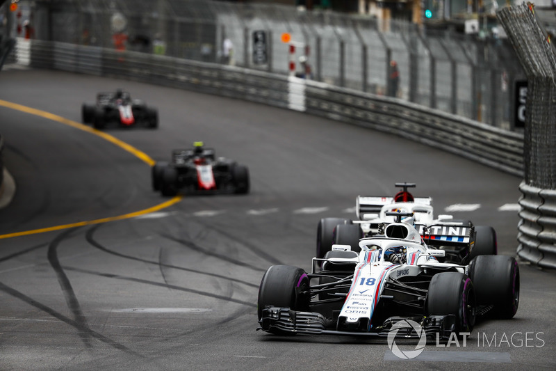 Lance Stroll, Williams FW41, leads Marcus Ericsson, Sauber C37, Kevin Magnussen, Haas F1 Team VF-18, and Romain Grosjean, Haas F1 Team VF-18