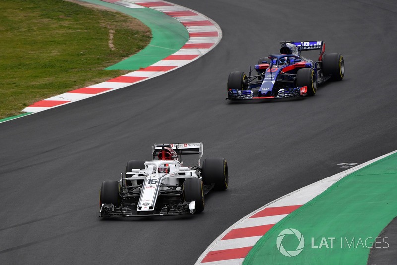 Charles Leclerc, Alfa Romeo Sauber C37 and Pierre Gasly, Scuderia Toro Rosso STR13