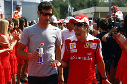 Mark Webber, Red Bull Racing, with Fernando Alonso, Ferrari