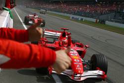 Michael Schumacher, Ferrari, second place Felipe Massa, Ferrari