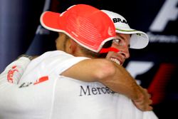 Jenson Button, Brawn GP is congratulated by Lewis Hamilton, McLaren