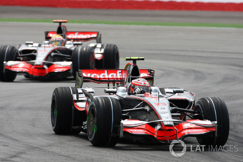 Heikki Kovalainen, Mclaren MP4/23 leads team mate Lewis Hamilton, McLaren Mercedes MP4/23