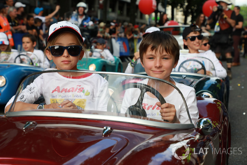 Little cars on the drivers parade
