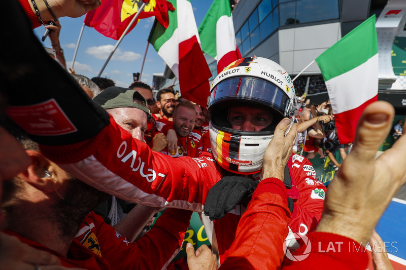 Race winner Sebastian Vettel, Ferrari, celebrates with his team in Parc Ferme