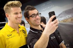 Nico Hulkenberg, Renault Sport F1 Team, with INFINITI Engineering Academy member