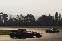 Sebastian Vettel, Ferrari SF70H, follows Carlos Sainz Jr., Toro Rosso STR12
