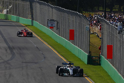 Lewis Hamilton, Mercedes AMG F1 W08, leads Sebastian Vettel, Ferrari SF70H