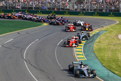 Lewis Hamilton, Mercedes AMG F1 W08, leads the field through the first corner