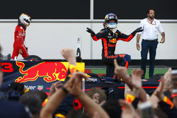 Daniel Ricciardo, Red Bull Racing, celebrates his victory in parc ferme ahead of Sebastian Vettel, F