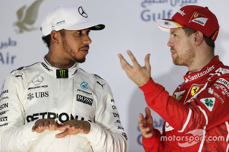 Podium: winner Sebastian Vettel, Ferrari, second place Lewis Hamilton, Mercedes AMG F1, third place Valtteri Bottas, Mercedes AMG F1