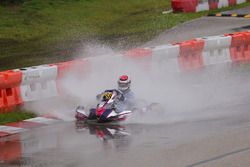 Ethan Ho tackles a large puddle