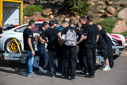 Romain Dumas and Raphaël Astier debrief with the team