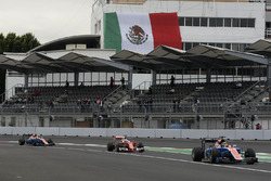 Pascal Wehrlein, Manor Racing MRT05, Sebastian Vettel, Ferrari SF16-H, Esteban Ocon, Manor Racing MRT05