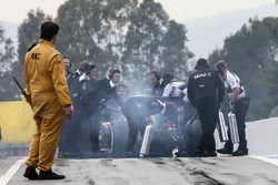 Jenson Button, McLaren MP4-31 stops at the end of the pit lane