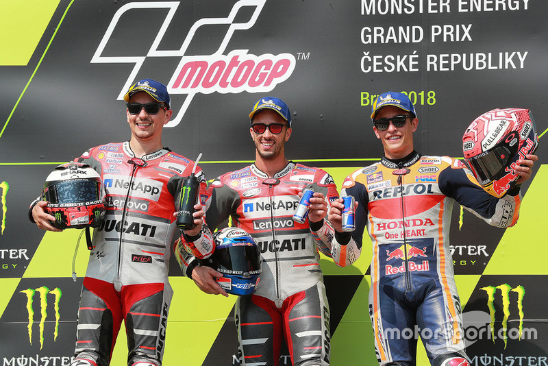 Podio: Andrea Dovizioso, Jorge Lorenzo y Marc Marquez