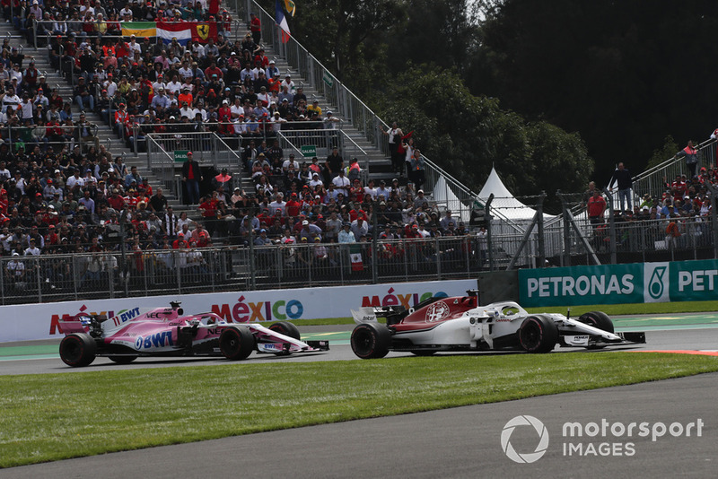 Marcus Ericsson, Sauber C37 and Sergio Perez, Racing Point Force India VJM11