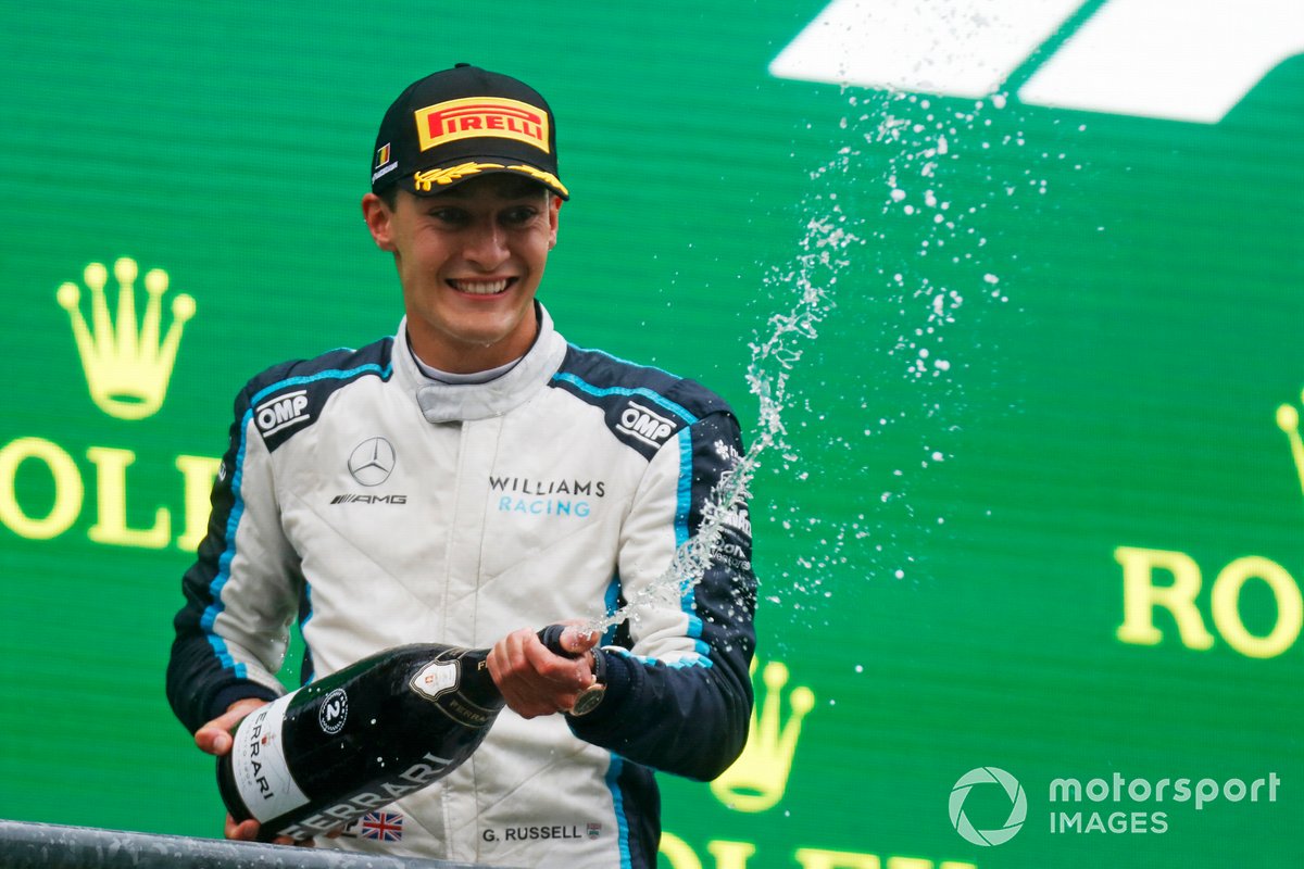 George Russell, Williams, 2nd position, sprays Champagne on the podium