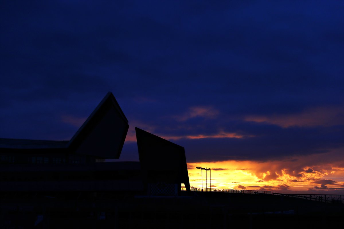 The sun rises over the circuit