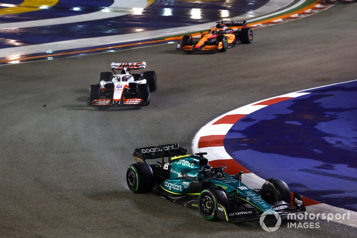 Lance Stroll, Aston Martin AMR22 Kevin Magnussen, Haas VF-22
