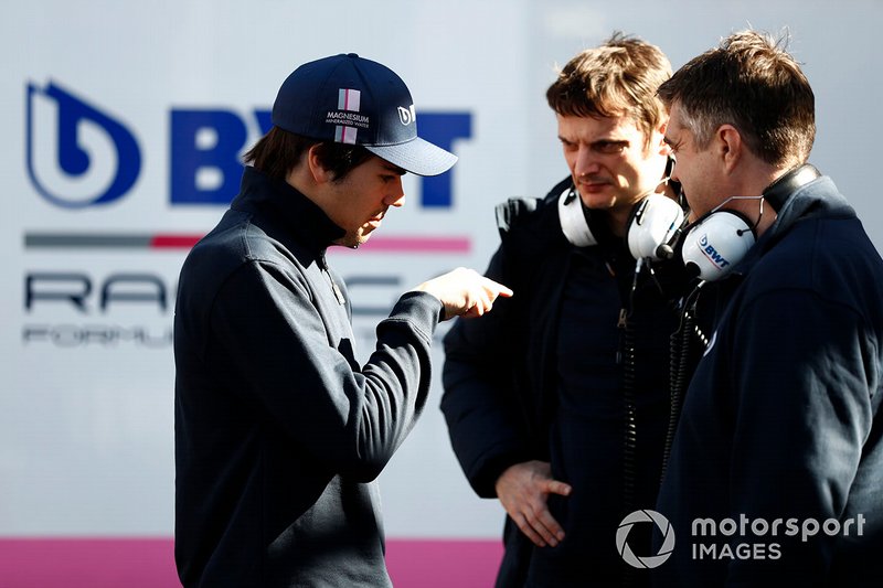 Lance Stroll, Racing Point talks to members of the team