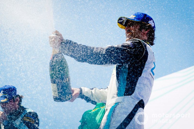 Race winner Sérgio Jimenez, Jaguar Brazil Racing celebrates with the champagne on the podium