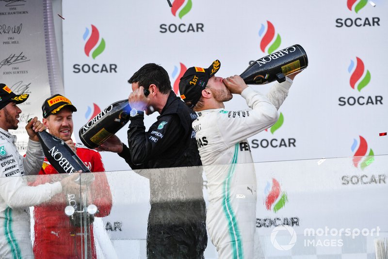 Valtteri Bottas, Mercedes AMG F1, 1st position, drinks Champagne on the podium