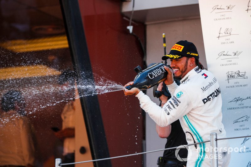 Lewis Hamilton, Mercedes AMG F1, 1st position, sprays Champagne from the podium