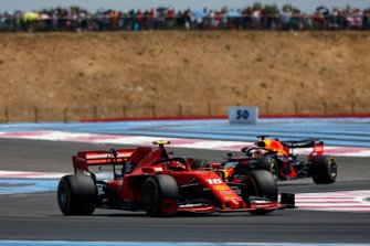 Charles Leclerc, Ferrari SF90, leads Max Verstappen, Red Bull Racing RB15