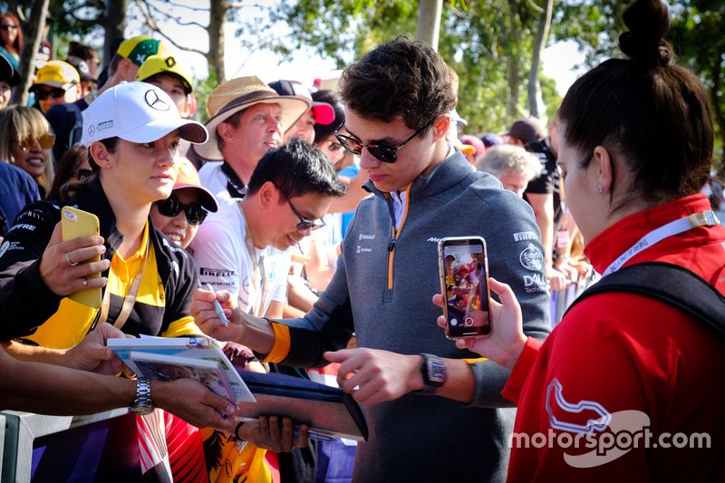 Lando Norris, McLaren signs autographs for fans