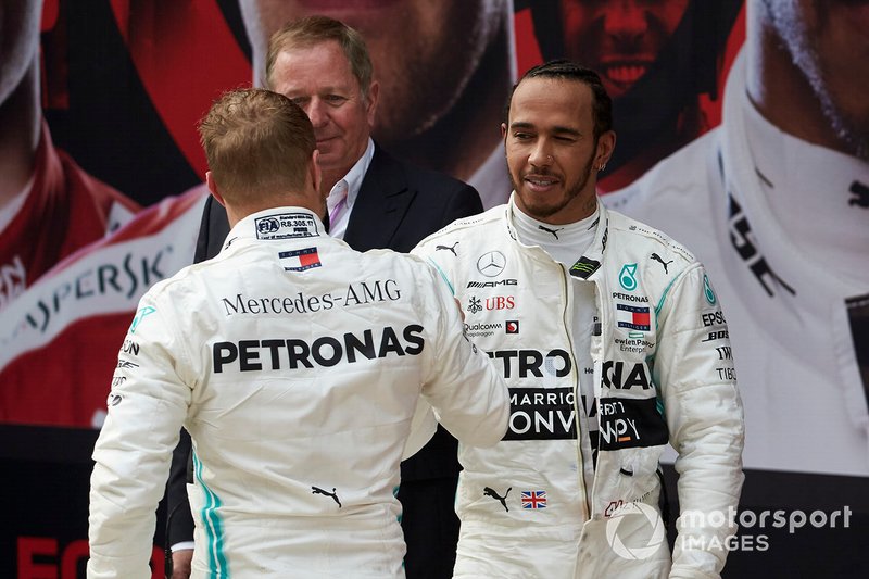 Valtteri Bottas, Mercedes AMG F1, 2nd position, and Lewis Hamilton, Mercedes AMG F1, 1st position, congratulate each other in Parc Ferme