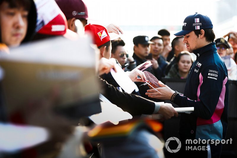 Lance Stroll, Racing Point signs an autograph for a fan