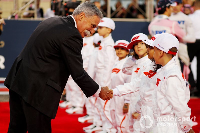 Chase Carey, Chairman, Formula 1, meets the Grid Kid mascots