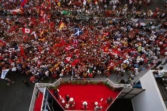 The podium: David Coulthard, McLaren, second, Michael Schumacher, Ferrari, race winner and Jacques Villeneuve, Williams third