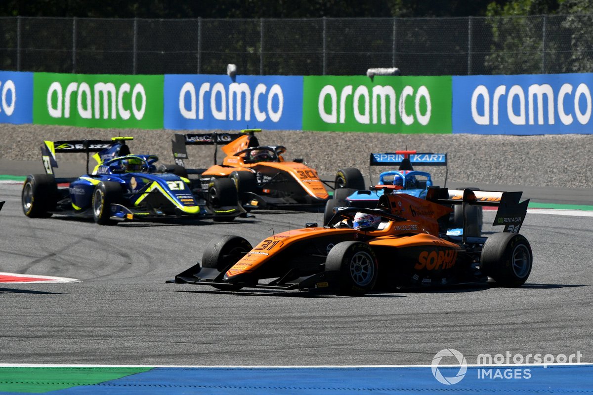 Sophia Floersch, Campos Racing, leads Enaam Ahmed, Carlin, and Alessio Deledda, Campos Racing