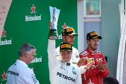 Second place Valtteri Bottas, Mercedes AMG F1, lifts his trophy