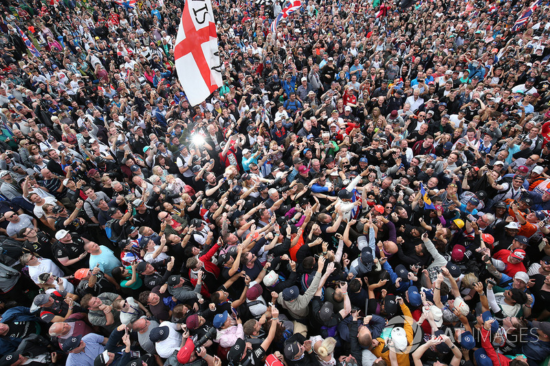 Race winner Lewis Hamilton, Mercedes AMG F1 goes crowd surfing