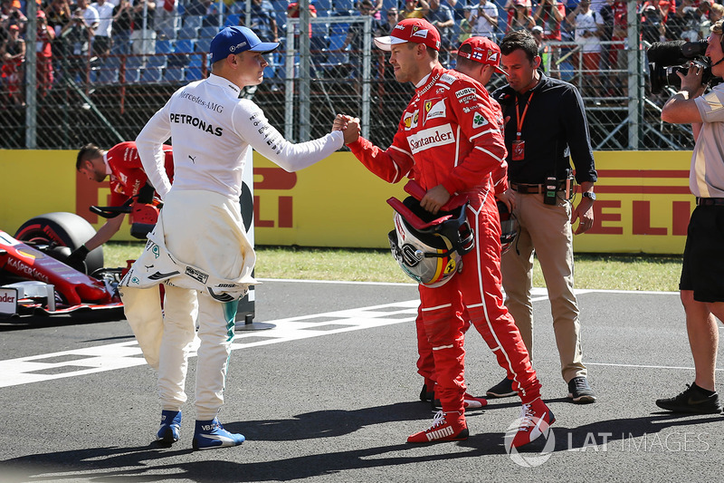 Pole: Sebastian Vettel, Ferrari, 2. Kimi Raikkonen, Ferrari, 3. Valtteri Bottas, Mercedes-Benz F1