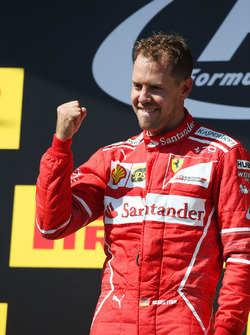 Podium: race winner Sebastian Vettel, Ferrari