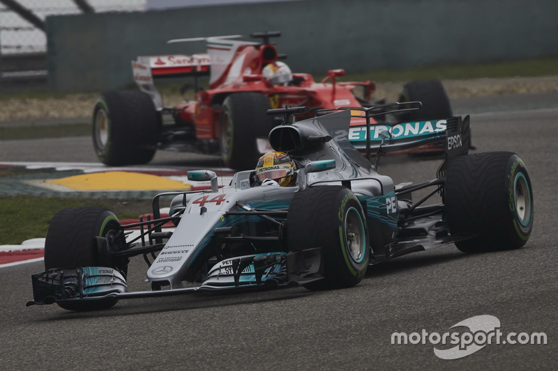 Lewis Hamilton, Mercedes AMG F1 W08, leads Sebastian Vettel, Ferrari SF70H