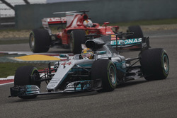 Lewis Hamilton, Mercedes AMG F1 W08, leads Sebastian Vettel, Ferrari SF70H
