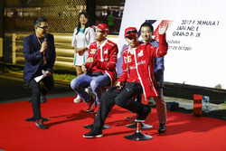 Sebastian Vettel, Ferrari, Kimi Raikkonen, Ferrari, on the stage in the F1 Fanzone