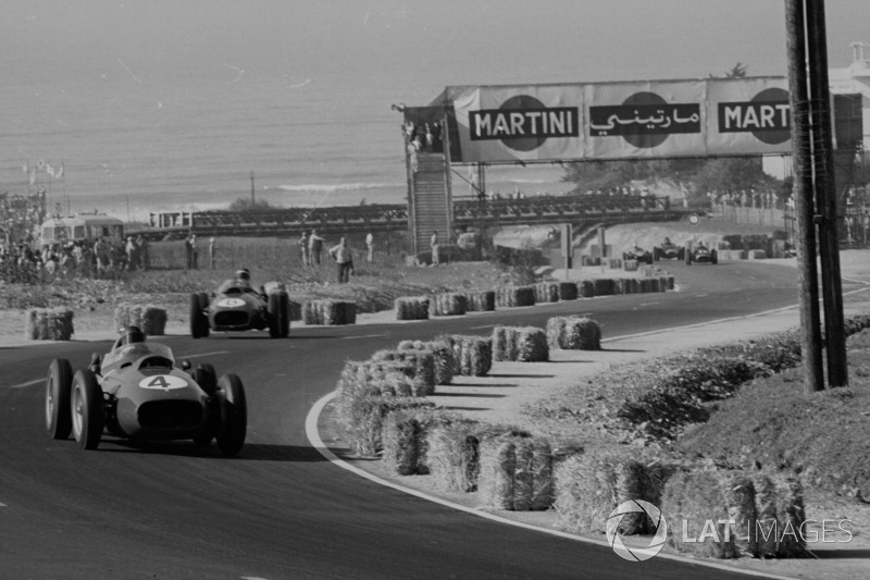 Phil Hill leads Mike Hawthorn, Ferrari Dino 246