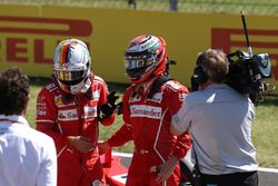 Pole sitter Sebastian Vettel, Ferrari and Kimi Raikkonen, Ferrari