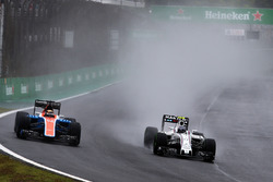(L to R): Pascal Wehrlein, Manor Racing MRT05 and Valtteri Bottas, Williams FW38 battle for position