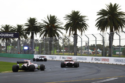 Esteban Ocon, Force India VJM10, follows a Ferrari and a Williams