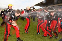 Race winners Garth Tander and Warren Luff, Holden Racing Team celebrate with the team