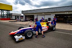 Engineers push the car of Philo Paz Armand, Trident